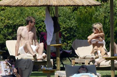 Abigail Clancy bikini candids Sardinia Italy on June 9, 2011 