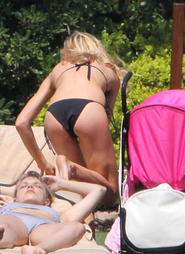 Abigail Clancy bikini candids in Italy on June 10, 2011 