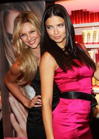 Adriana Lima and Candice Swanepoel Bombshell fragrance launch in Soho on September 25, 2010 