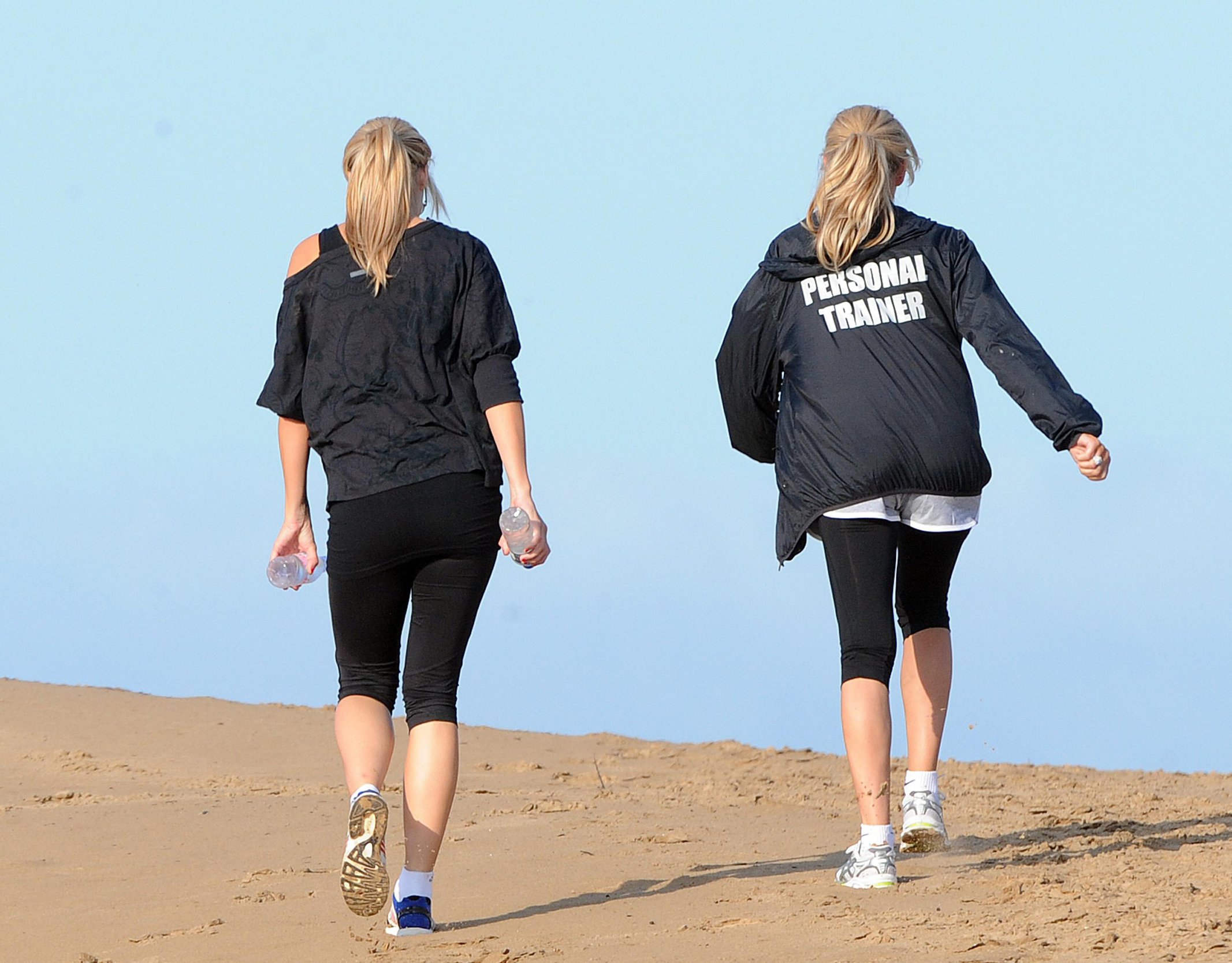 Alex Curran - Personal training session on a beach on September 19, 2011