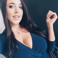Angela White taking a selfie