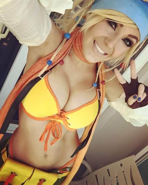 Jessica Nigri in a bikini taking a selfie