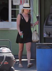Ali Larter - Leggy in Black Dress at a Car Wash in Hollywood - August 9, 2012