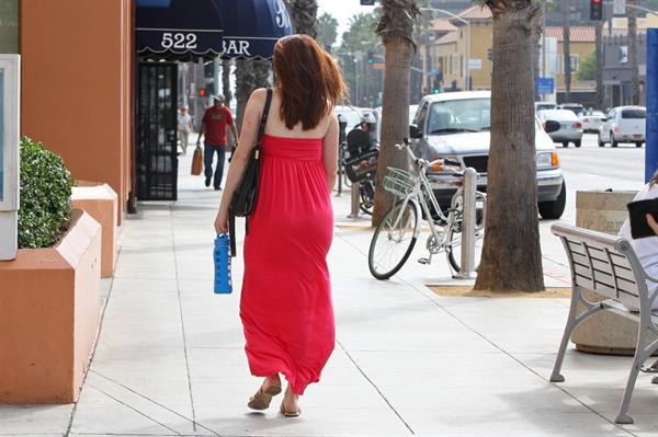 Alyson Hannigan in a red dress in Santa Monica on August 20, 2012