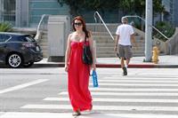 Alyson Hannigan in a red dress in Santa Monica on August 20, 2012