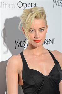 Amber Heard attending the Metropolitan Opera Gala premiere of Manon in New York on March 26, 2012 