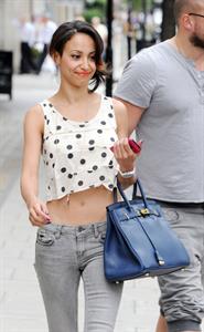 Amelle Berrabah walking in London on July 5, 2011