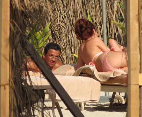 Amy Childs sunbathing with Peter Andre in Dubai on January 3, 2012