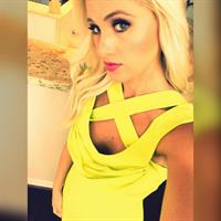 Tomi Lahren taking a selfie