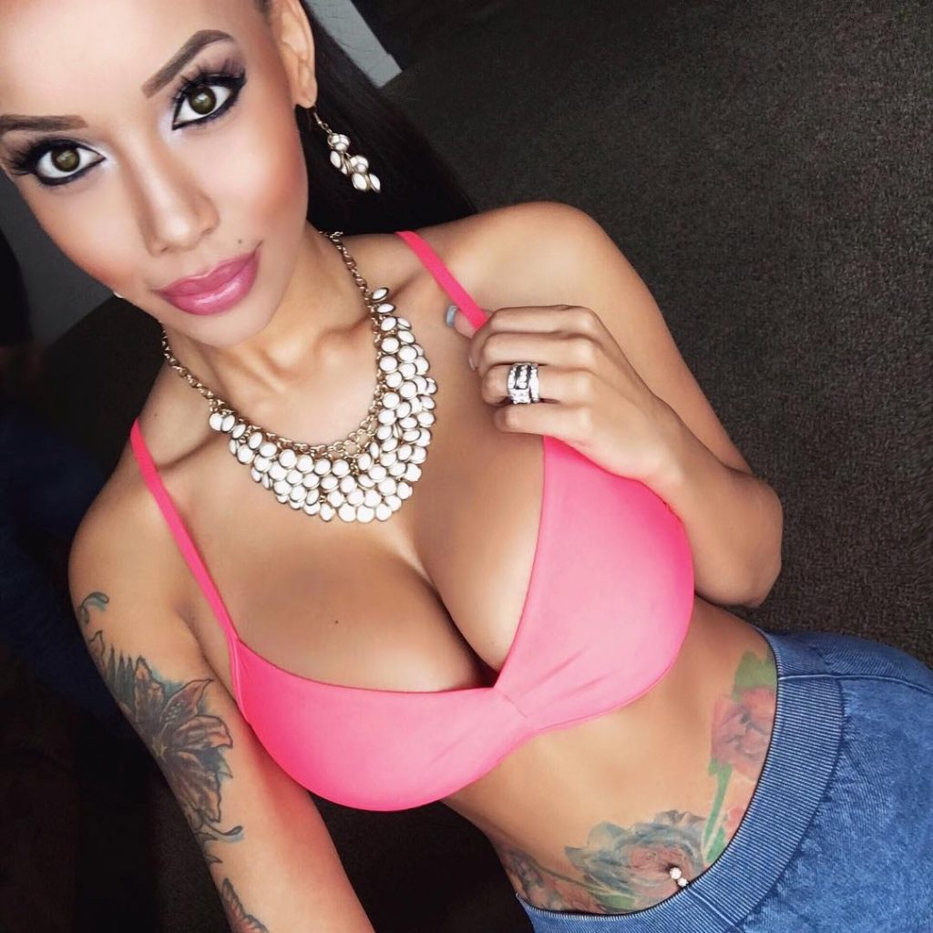 Breana Bowens in a bikini taking a selfie
