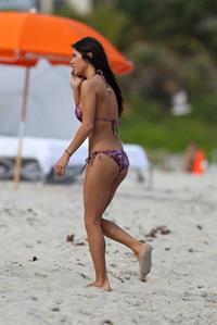 Arianny Celeste bikini candids on a beach in Miami on February 16, 2012