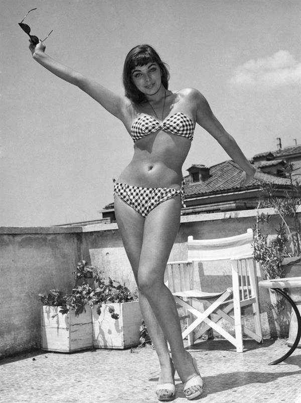 Joan Collins in a bikini