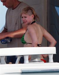 Avril Lavigne in a green bikini in Cabo, Mexico on July 27, 2012
