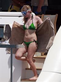 Avril Lavigne in a green bikini in Cabo, Mexico on July 27, 2012