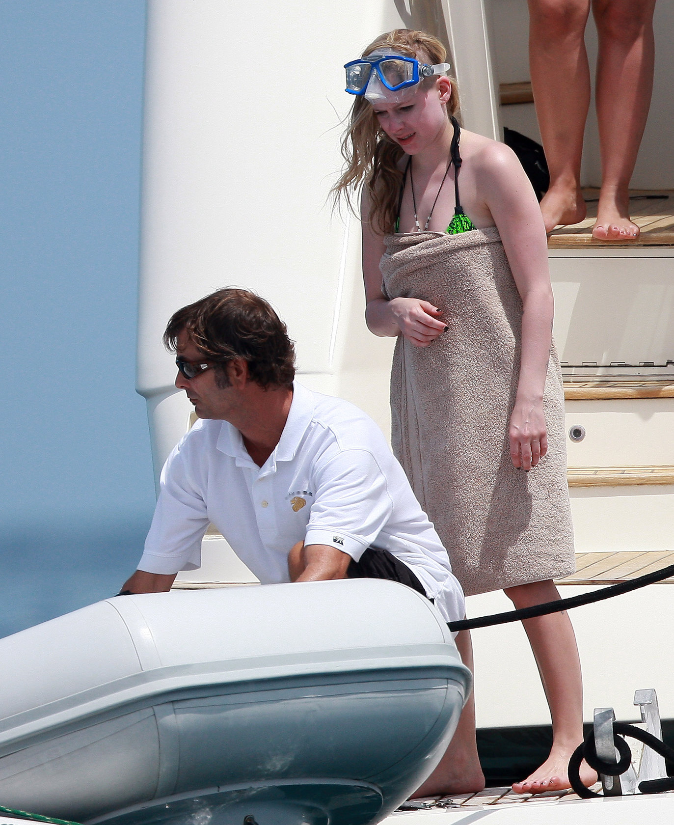 Avril Lavigne in a green bikini in Cabo, Mexico on July 27, 2012