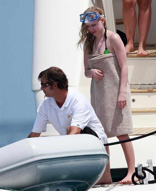 Avril Lavigne in a green bikini in Cabo, Mexico on July 27, 2012