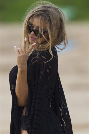 Carmen Electra – beach shoot candids in Hawaii 10/3/13  