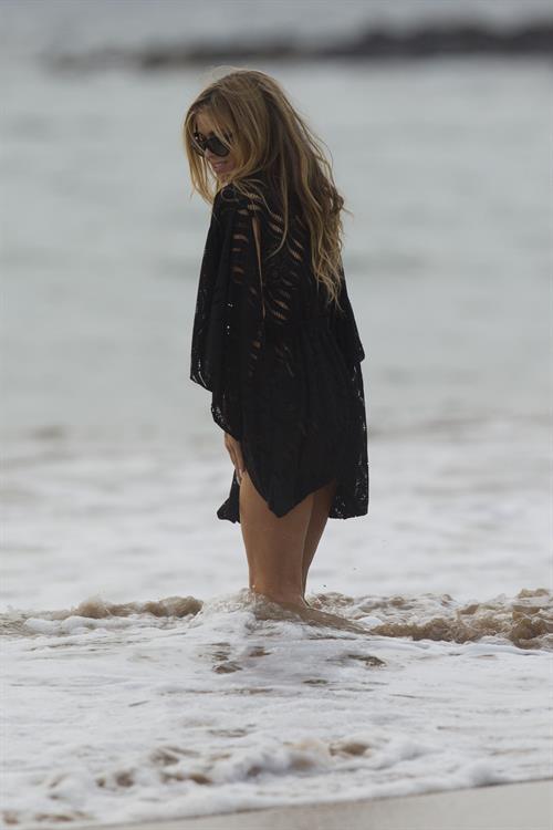 Carmen Electra – beach shoot candids in Hawaii 10/3/13  