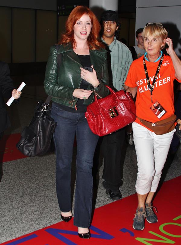 Christina Hendricks - Arriving on a flight at the Toronto International Airport - September 5, 2012