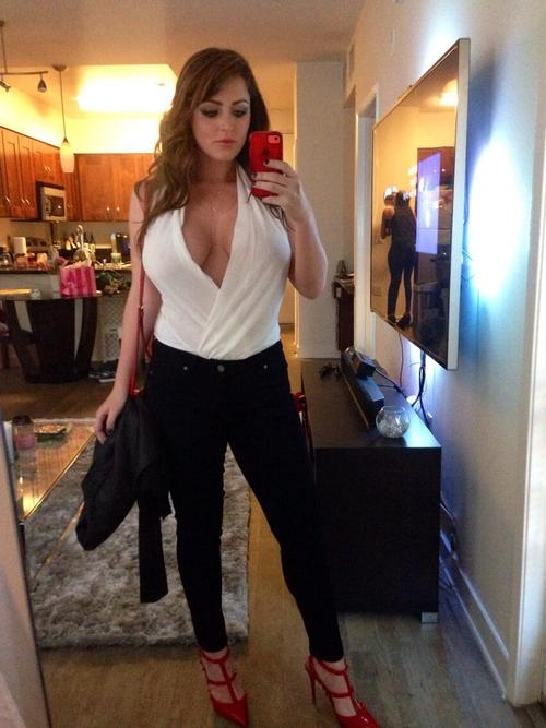 Sophie Dee taking a selfie