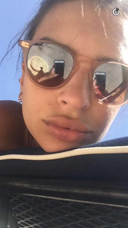Emily Ratajkowski taking a selfie
