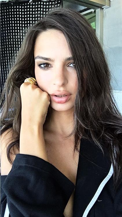 Emily Ratajkowski taking a selfie