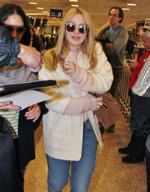 Dakota Fanning arriving in Salt Lake City to attend the Sundance Film Festival 1/21/13 