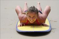 Daniela Hantuchova bikini beach surfing candids in Brisbane, Australia, December 26, 2012 