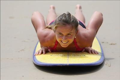 Daniela Hantuchova bikini beach surfing candids in Brisbane, Australia, December 26, 2012 