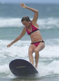 Daniela Hantuchova bikini beach surfing candids in Brisbane, Australia, December 26, 2012 