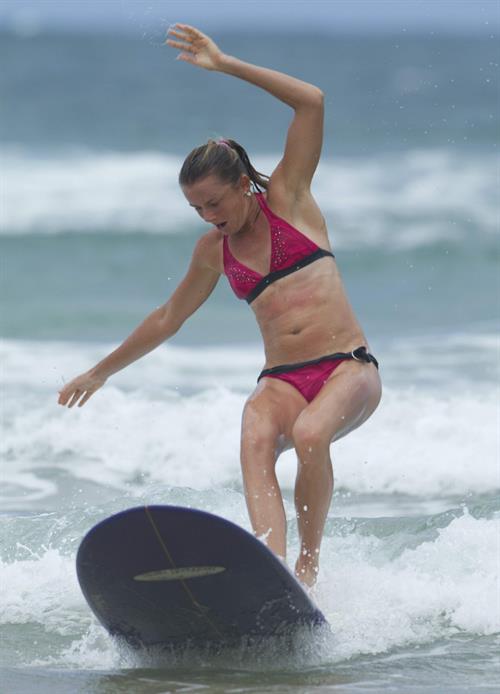 Daniela Hantuchova bikini beach surfing candids in Brisbane, Australia, December 26, 2012 