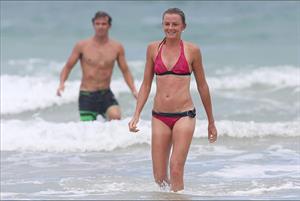 Daniela Hantuchova bikini beach surfing candids in Brisbane, Australia, December 26, 2012 