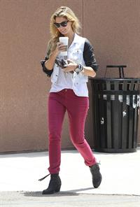 Delta Goodrem - Stopping to get a coffee on her way to work in Los Angeles, California - July 18, 2012