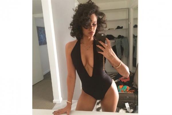 Nazanin Mandi in a bikini taking a selfie