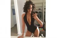 Nazanin Mandi taking a selfie