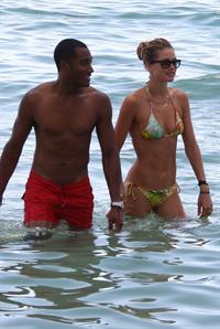 Doutzen Kroes bikini beach pictures in Miami August 16, 2012