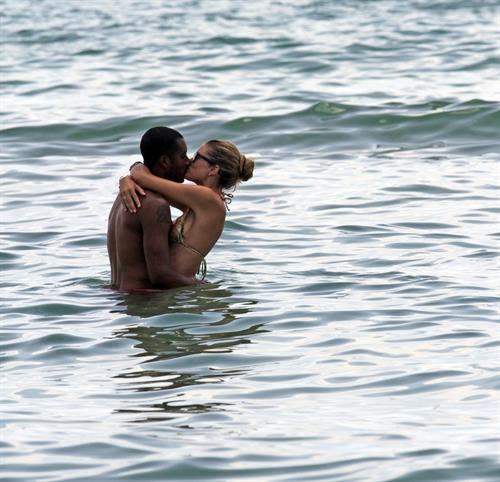 Doutzen Kroes bikini beach pictures in Miami August 16, 2012