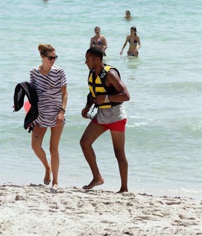 Doutzen Kroes bikini beach pictures in Miami August 16, 2012