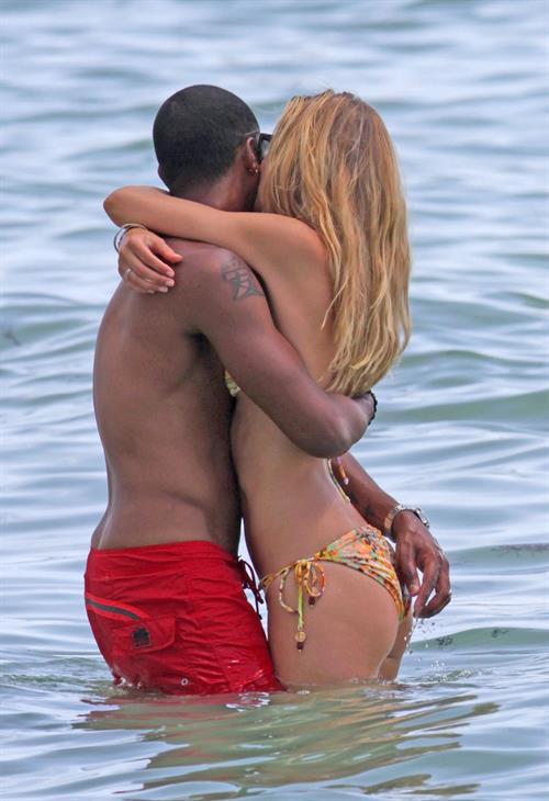 Doutzen Kroes bikini beach pictures in Miami August 16, 2012