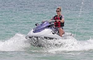 Doutzen Kroes bikini beach pictures in Miami August 16, 2012