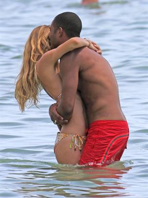 Doutzen Kroes bikini beach pictures in Miami August 16, 2012