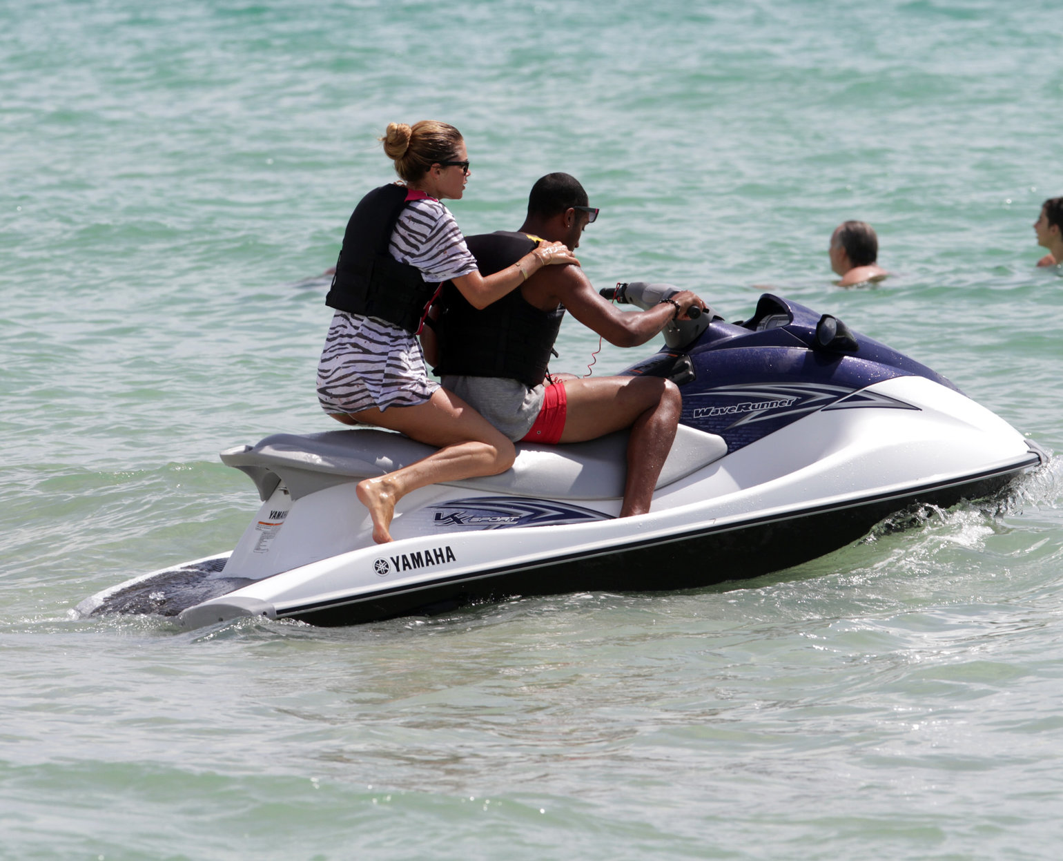 Doutzen Kroes bikini beach pictures in Miami August 16, 2012