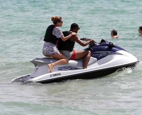 Doutzen Kroes bikini beach pictures in Miami August 16, 2012