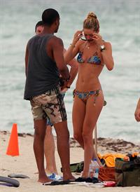 Doutzen Kroes bikini candids on the beach in Miami, Florida Augusts 15, 2012