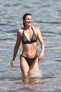 Ellen Pompeo - Wearing a sexy wet bikini on a beach in Maui (June 6, 2012)
