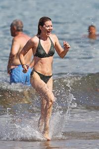 Ellen Pompeo - Wearing a sexy wet bikini on a beach in Maui (June 6, 2012)