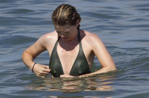 Ellen Pompeo - Wearing a sexy wet bikini on a beach in Maui (June 6, 2012)