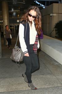 Emilia Clarke LAX airport in Los Angeles, October 15, 2013 