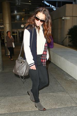 Emilia Clarke LAX airport in Los Angeles, October 15, 2013 
