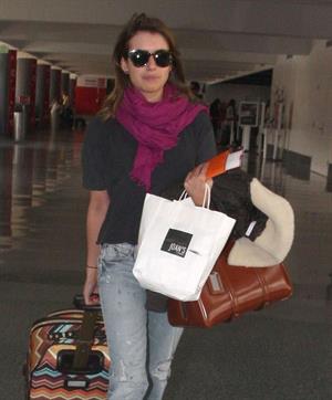 Emma Roberts departing on a flight at LAairport in Los Angeles, California on December 22, 2012 